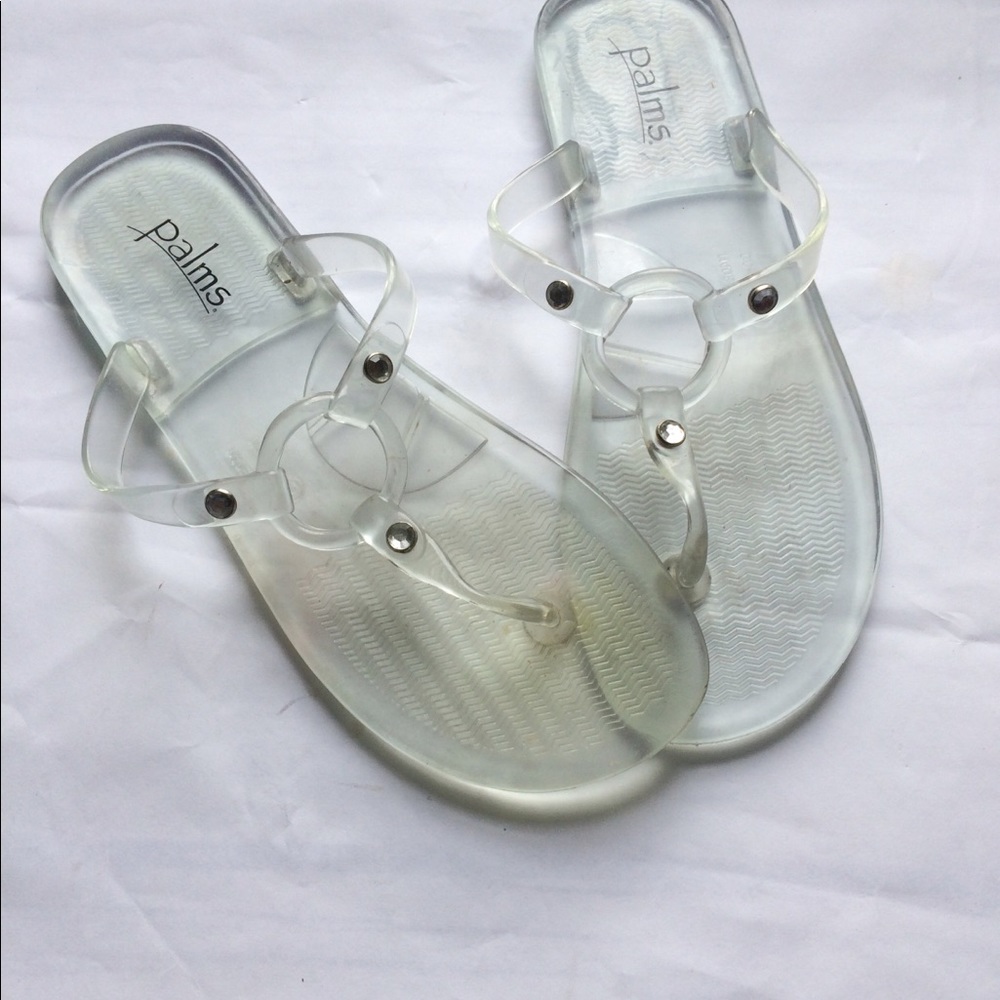 Clear jelly flip flops size 3